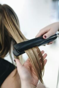 Hair rebonding process using flat iron and chemicals